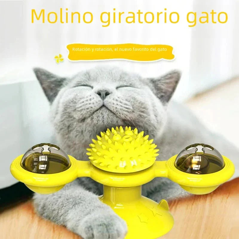 Yellow twirling cat fun toy with spinning lights and textured center, shown with gray cat playing