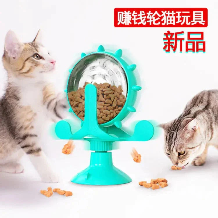 Twirling Cat Fun Toy in green with light, interactive rotating spring design filled with cat treats and two cats playing around it
