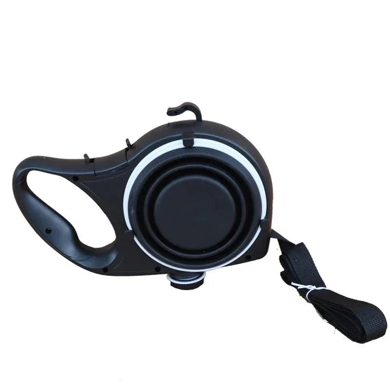 Travel dog leash kit with lightweight black plastic retractable leash and attached collapsible water bowl for pet walks
