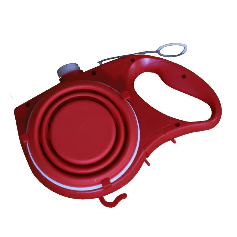 Red travel dog leash kit with built-in collapsible water bowl and ergonomic handle