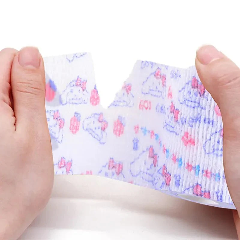 Hands tearing pet self-stick fabric bandage with colorful animal prints, flexible and breathable wrap for pet wound care