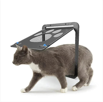 Black PawGuard Chew-Proof Pet Door with magnetic closure installed on a gray cat walking through it