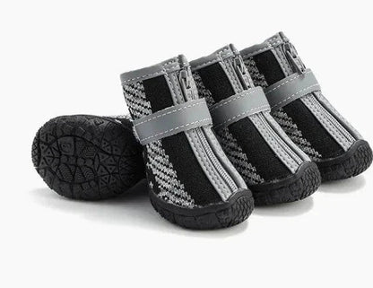 Black and gray lightweight pet shoes with anti-slip soles and secure straps for dog paw protection