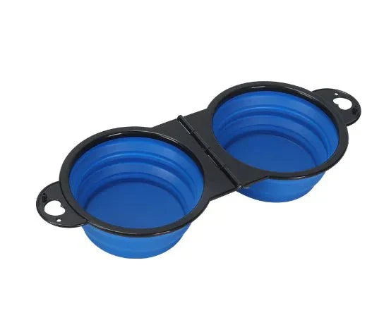 Compact foldable dual sided travel pet feeder in blue silicone for easy feeding and hydration on the go
