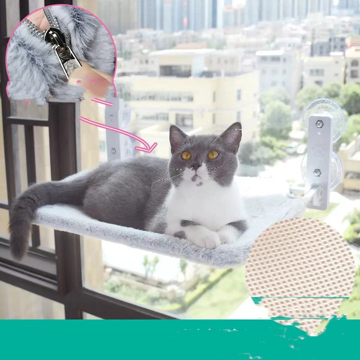 Grey and white cat lounging on a plush cat window hammock attached to a window with suction cups, showing secure zipper detail and close-up of breathable mesh fabric